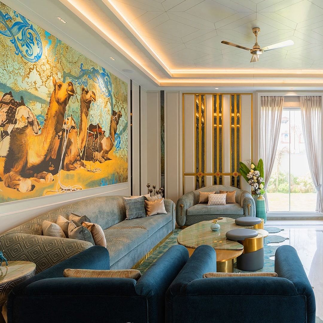 22. Blue-Grey Living Room with Statement Artwork and Gold Accents - blue and grey living room ideas