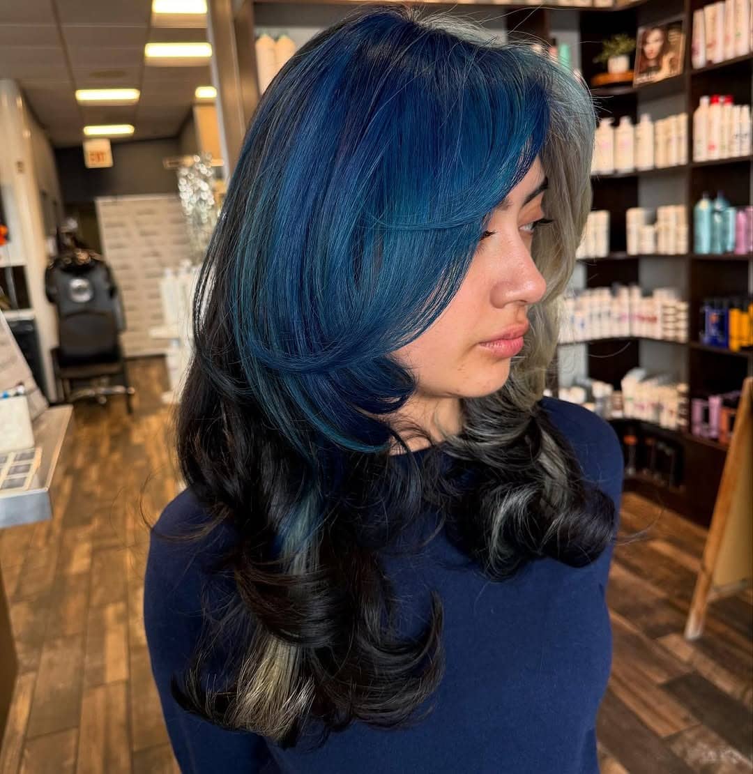 1. Midnight Blue Layered Blowout - Blue Hair Color