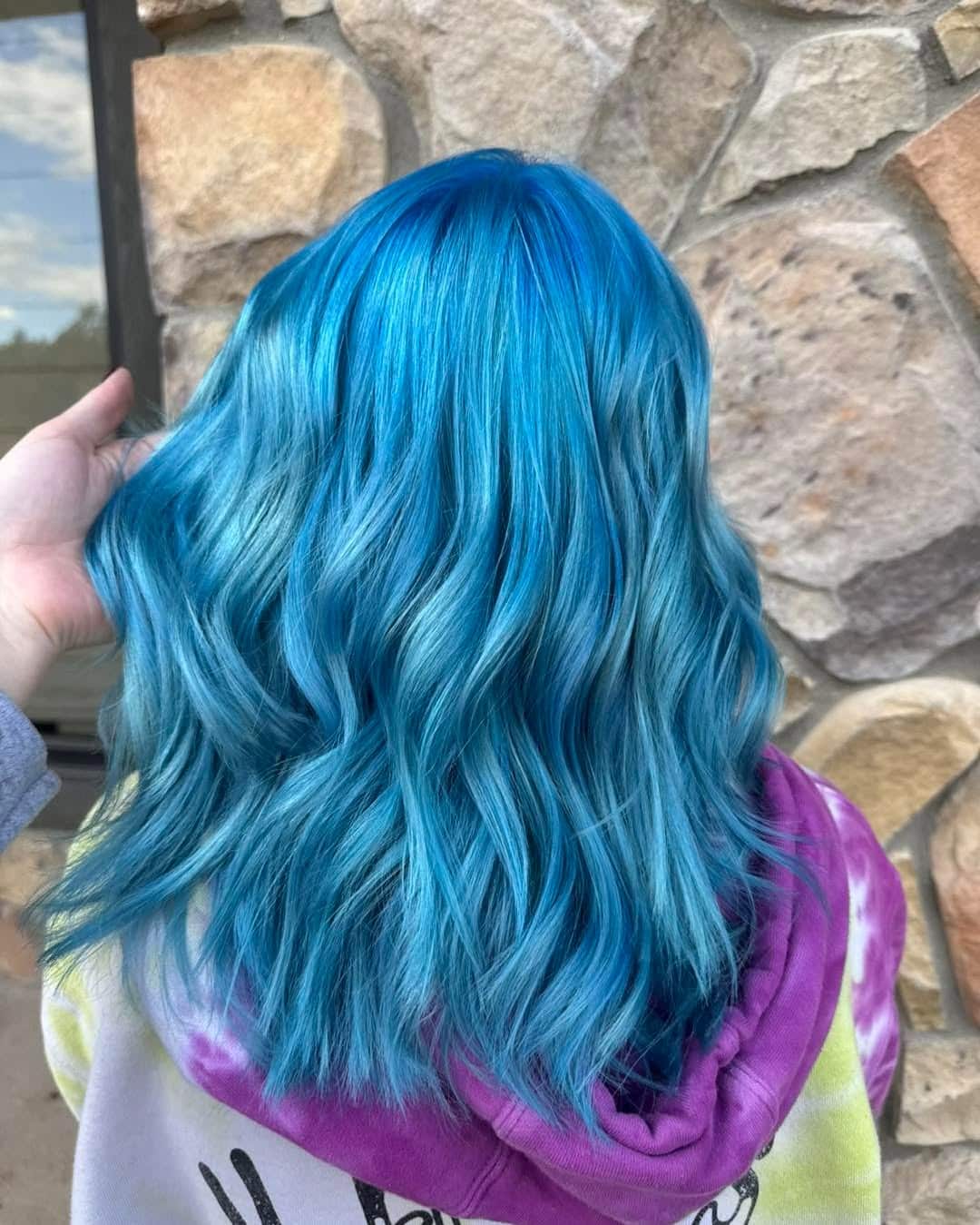 8. Icy Blue Soft Volume Style - Blue Hair Color