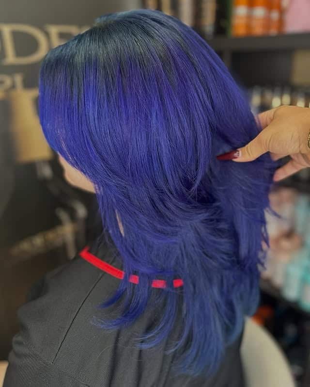 11. Indigo Blue Feathered Layers - Blue Hair Color