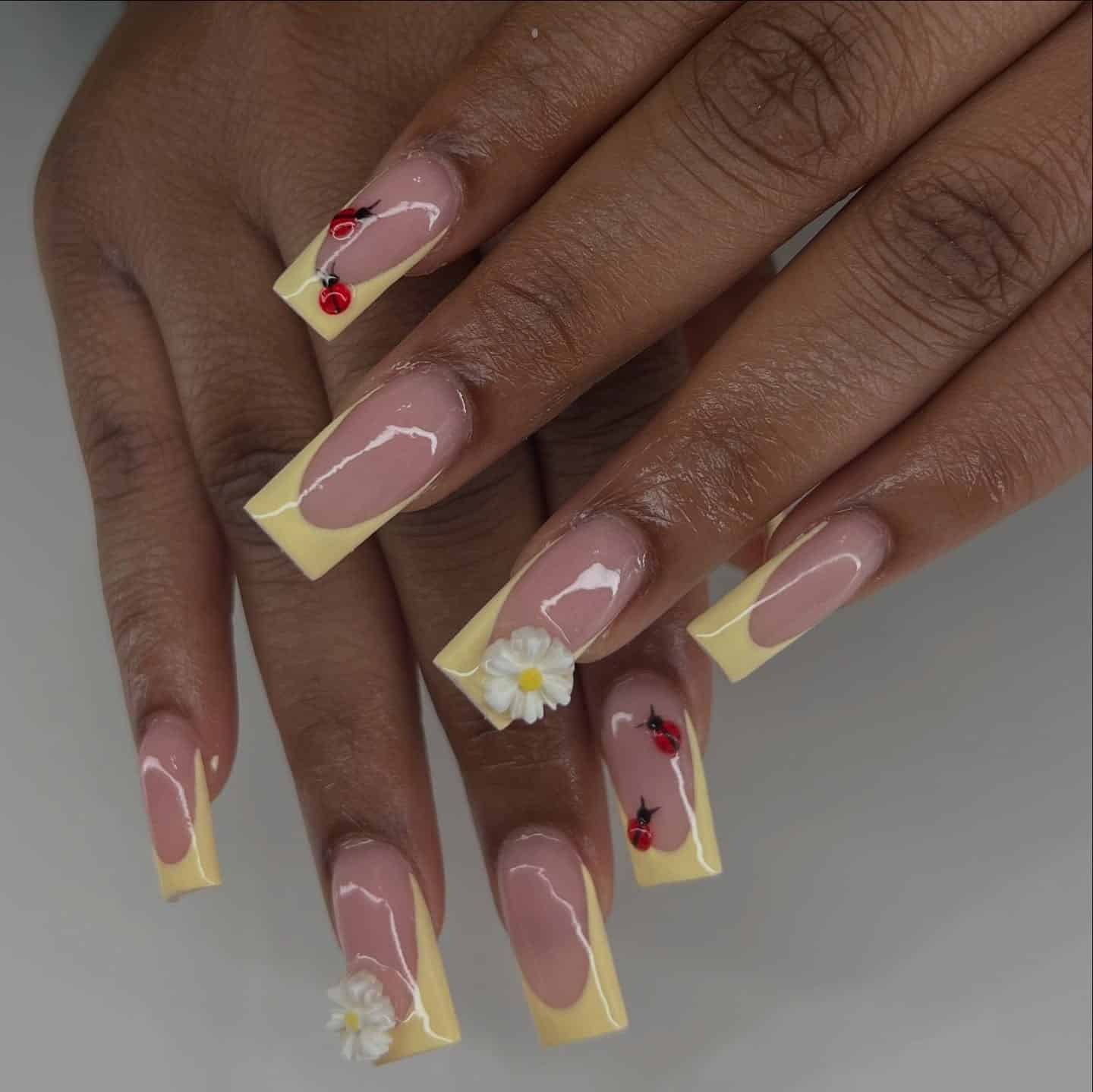 3. Lemon Yellow French Tips with Ladybug Art - spring french tip nail ideas
