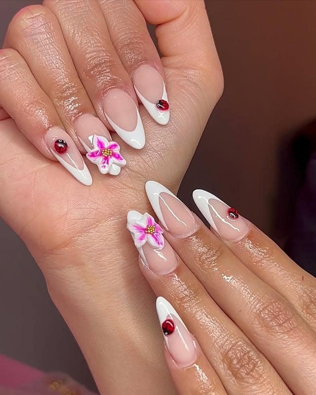14. White French Tips with Floral and Ladybug Accents - spring french tip nail ideas