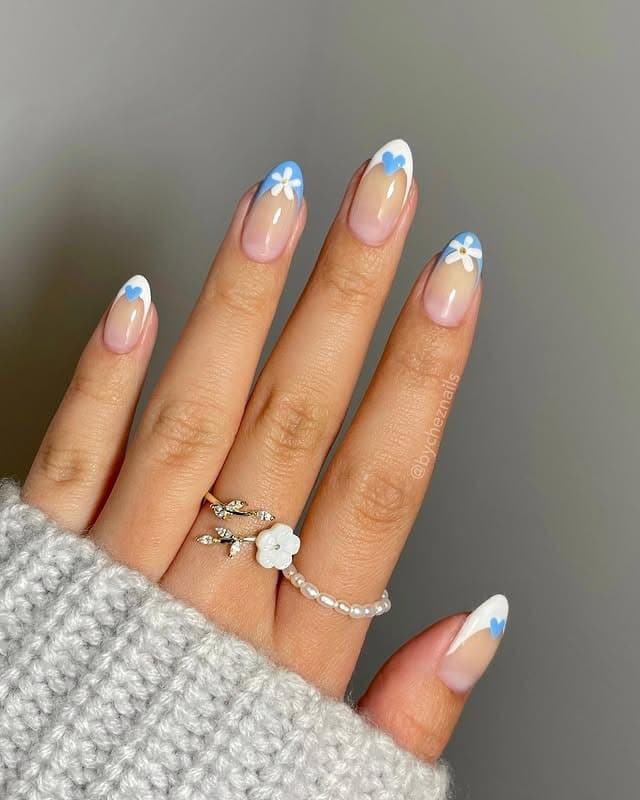 19. Blue and White Floral French Tips - spring french tip nail ideas