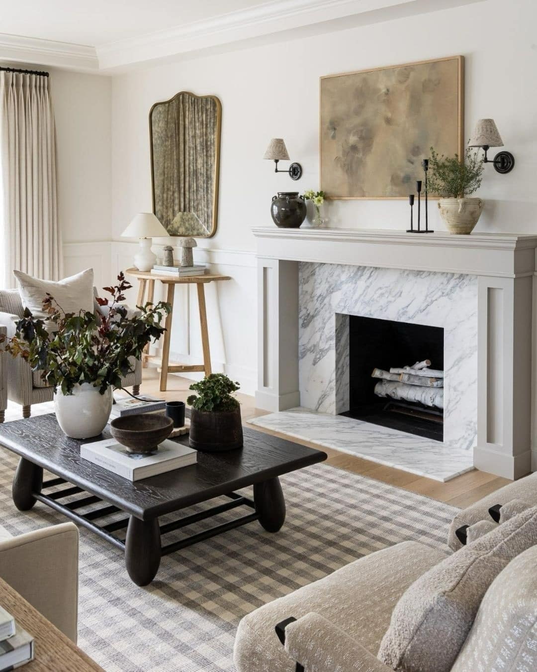 3. Refined Gray with Marble Fireplace Focus - gray living room ideas