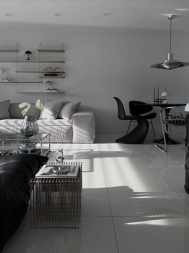 8. Monochrome Gray with High-Contrast Accents - gray living room ideas