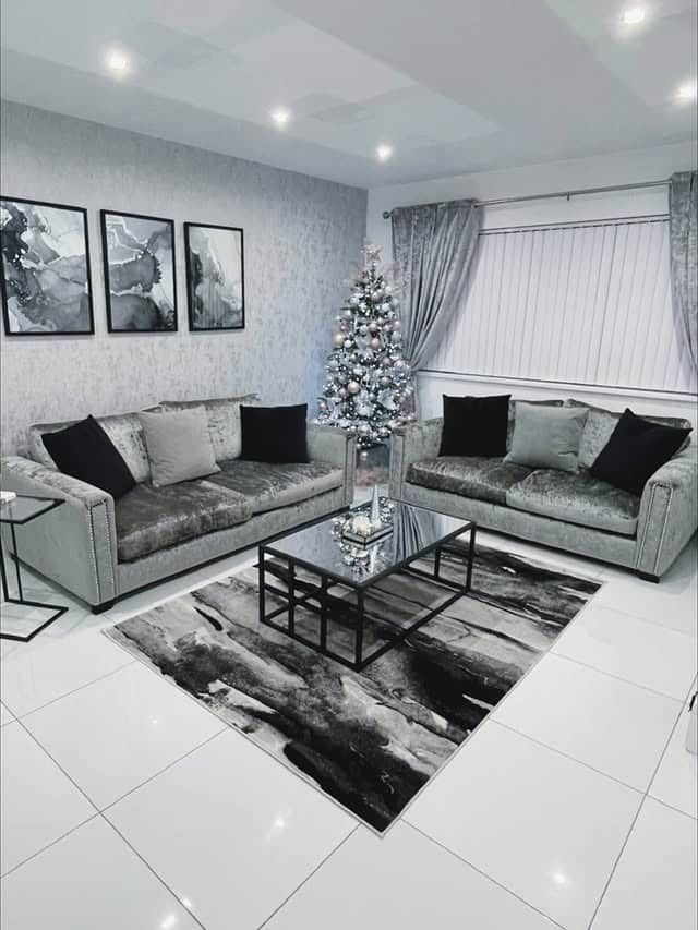 14. Elegant Gray Living Room with Monochrome Styling - gray living room ideas