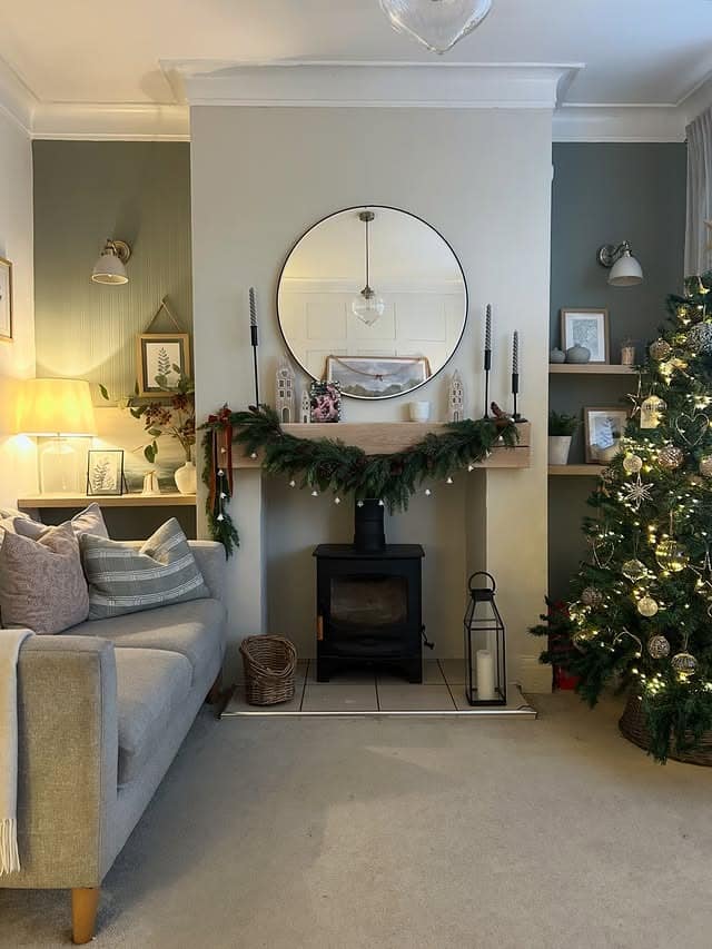 17. Seasonal Gray Living Room with Fireplace Focus - gray living room ideas