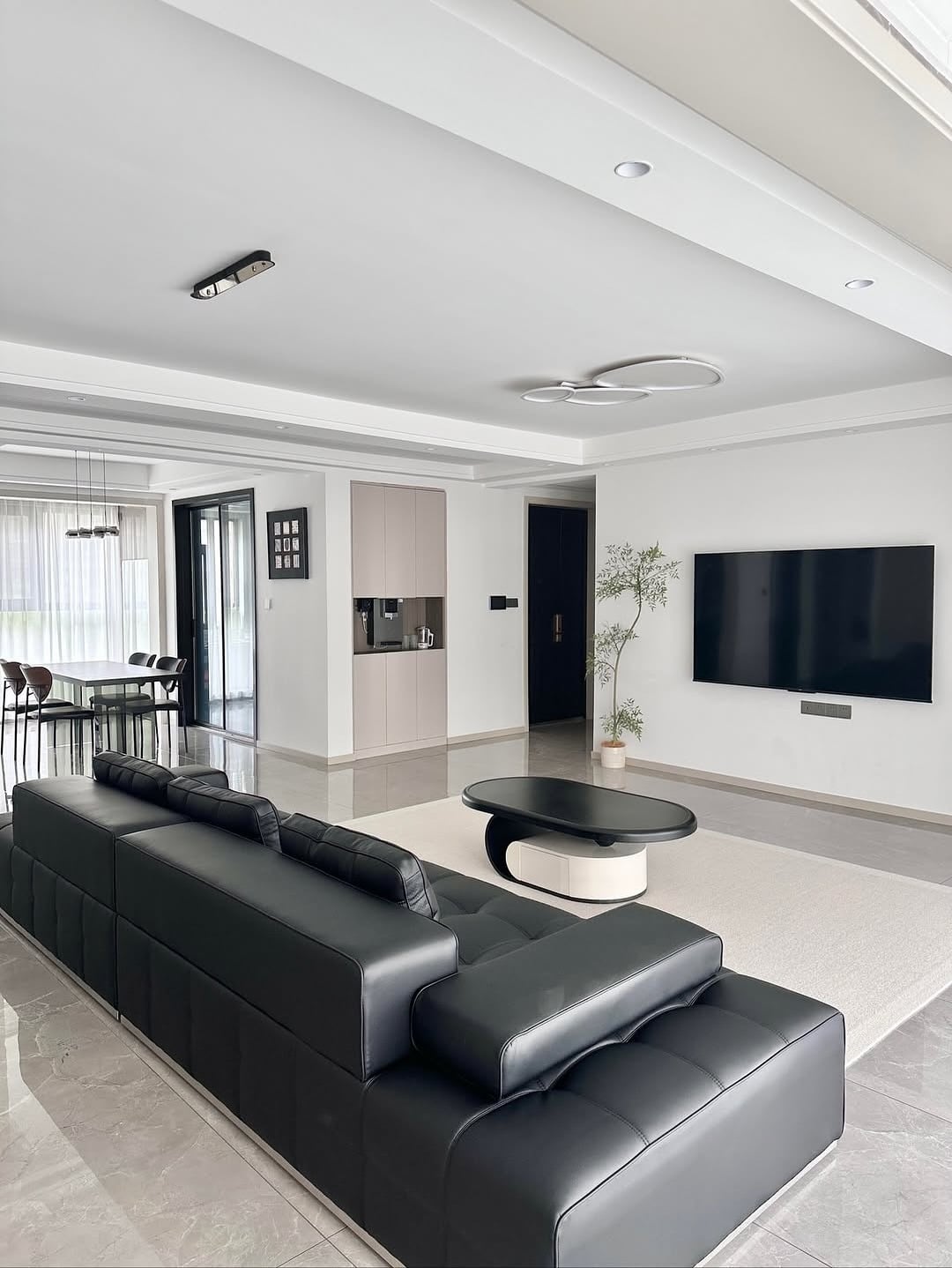 18. Open-Plan Gray Living Room with Modern Contrast - gray living room ideas