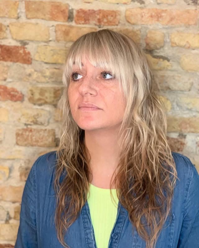 5. Wavy Mid-Length Cut with Micro Bangs in Ash Blonde - Wavy Hair with Bangs