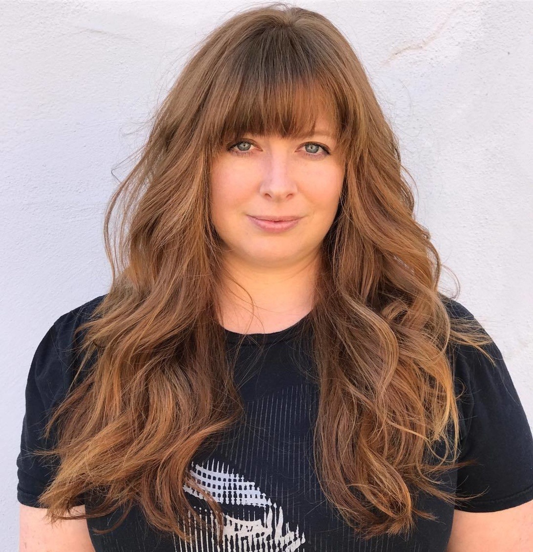 17. Long Wavy Layers with Straight Bangs in Soft Brown - Wavy Hair with Bangs