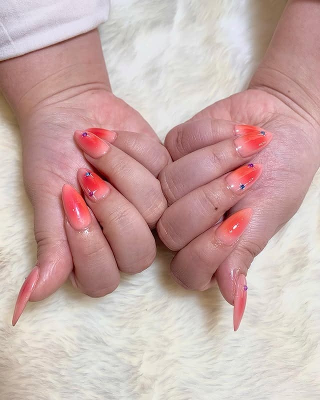 2. Coral Fade Stiletto Nails - sunset nail ideas