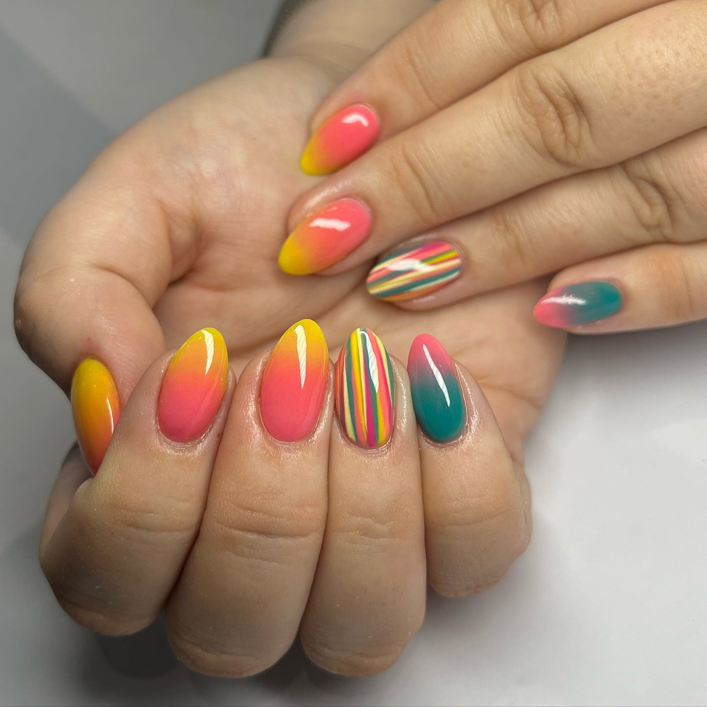 5. Tropical Sunset Accent Nails - sunset nail ideas