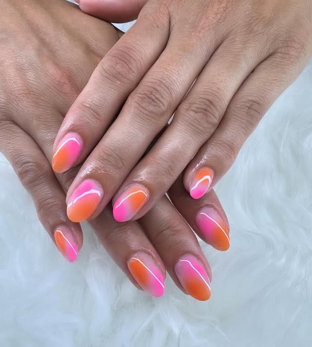 7. Pink Orange Swirl Sunset Nails - sunset nail ideas