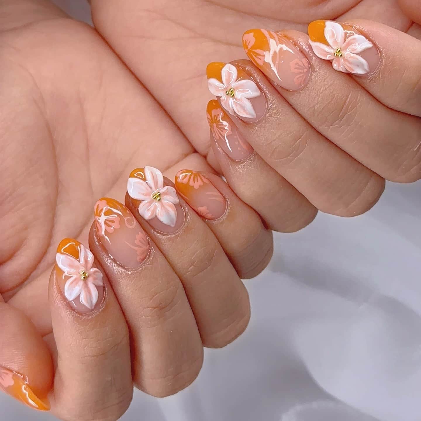 9. Floral Sunset French Almond - sunset nail ideas