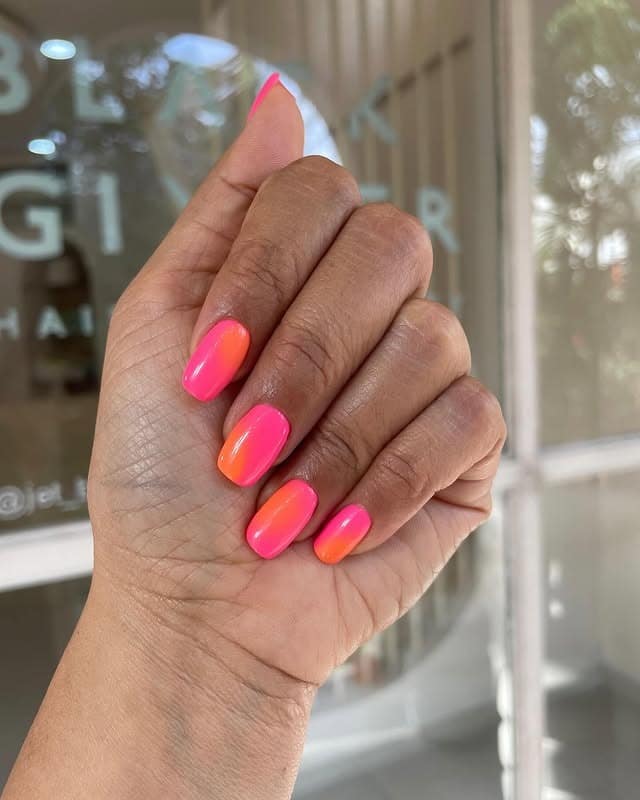 16. Neon Sunset Short Oval Nails - sunset nail ideas