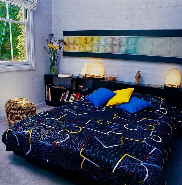 2. Modern Graphic Bedroom with Deep Navy and Steel Gray - navy blue and gray bedroom ideas