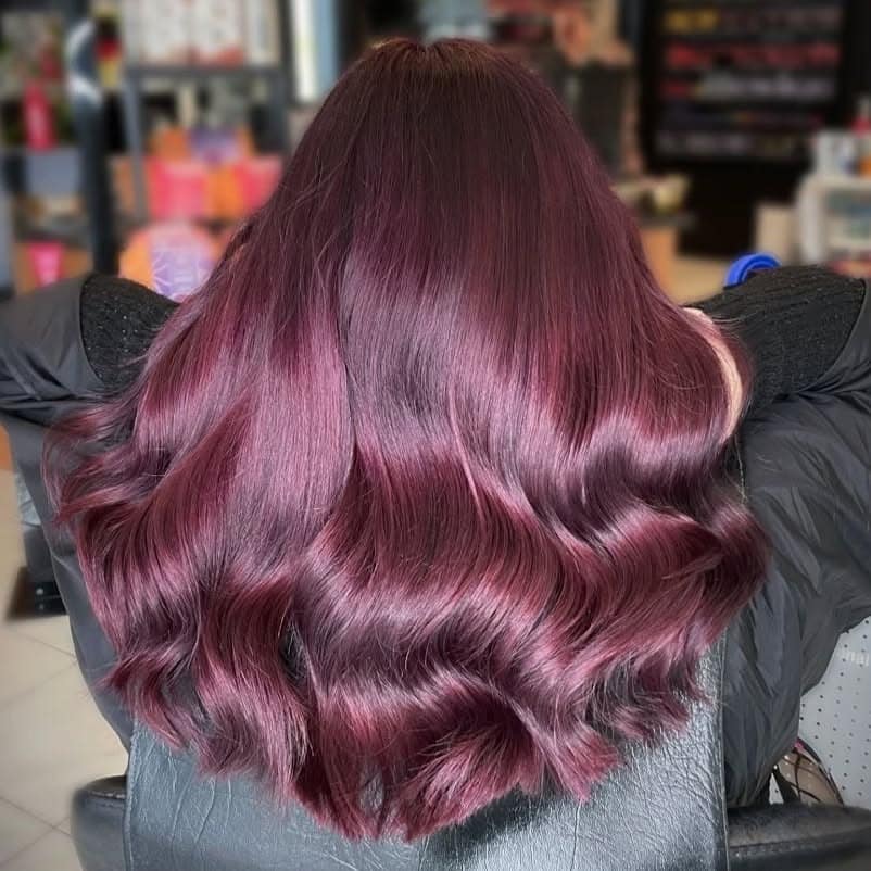 4. Plum Wine Waves with High Shine - Plum Hair Color