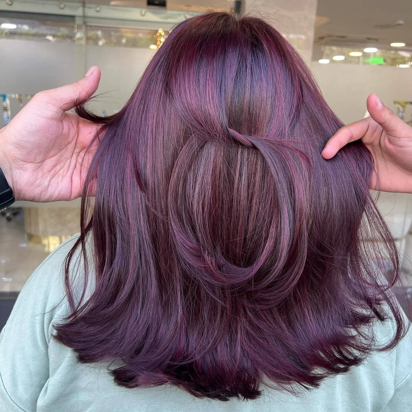 7. Textured Plum Layers with Modern Volume - Plum Hair Color