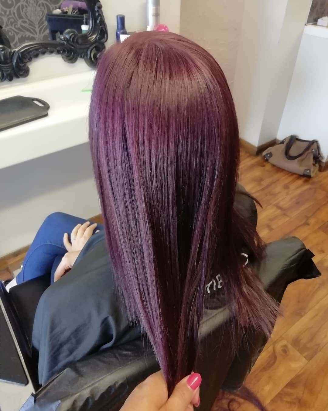 13. Sleek Plum Straight with Polished Shine - Plum Hair Color