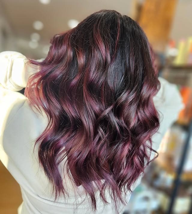 17. Dark Plum Waves with Subtle Contrast - Plum Hair Color