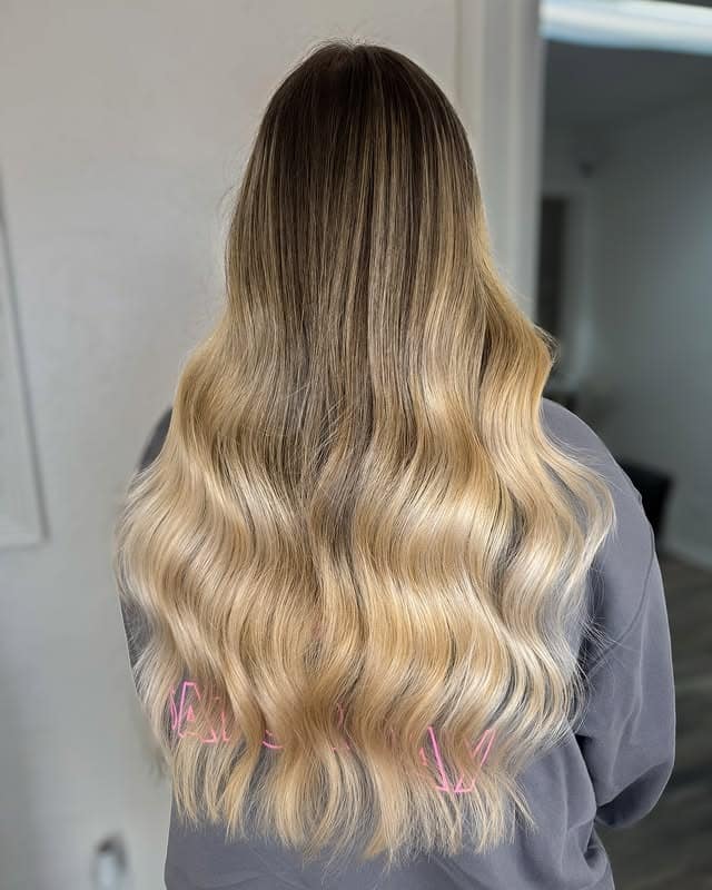 5. Honey Brown Balayage with Airy Waves - Honey Hair Color