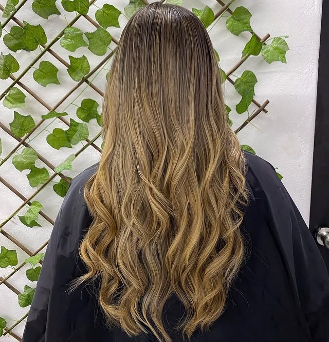 9. Golden Honey Balayage with Defined Texture - Honey Hair Color