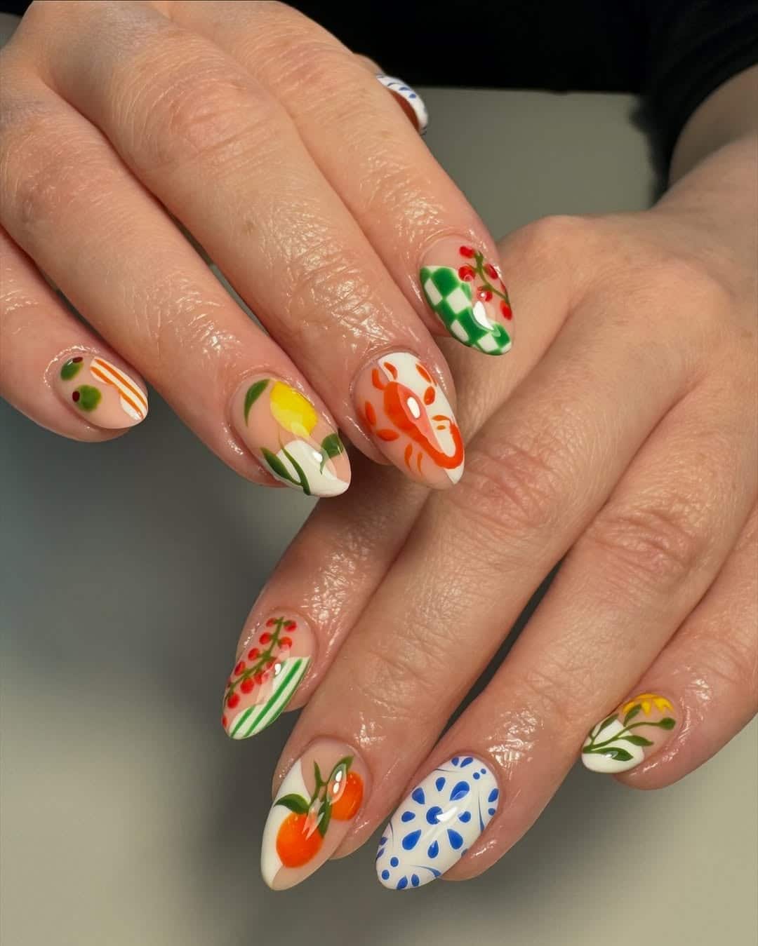 8. Hand-Painted Tropical Garden Almond Nails in Multicolor - tropical flower nail ideas