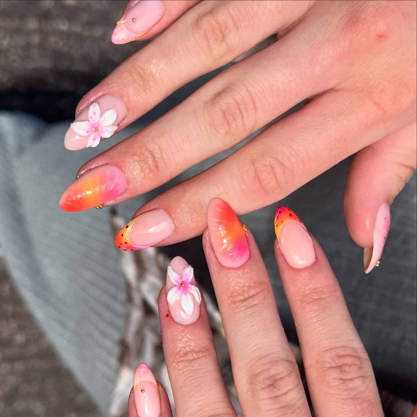 18. Sunset Tropical Flower Almond Nails in Pink and Coral - tropical flower nail ideas