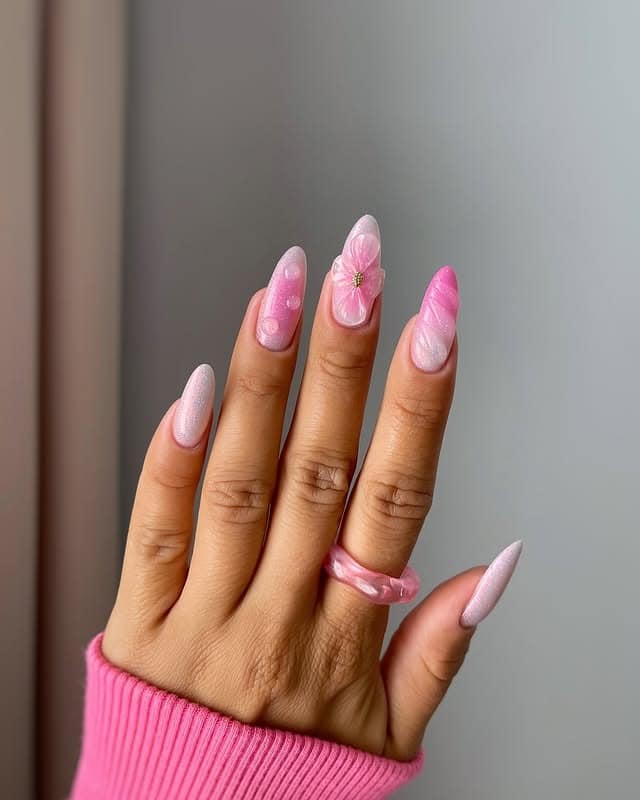 19. Pearlescent Tropical Floral Almond Nails in Soft Pink - tropical flower nail ideas