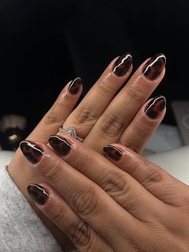 5. Dark Tortoiseshell Almond Nails with High Shine - turtle nail ideas
