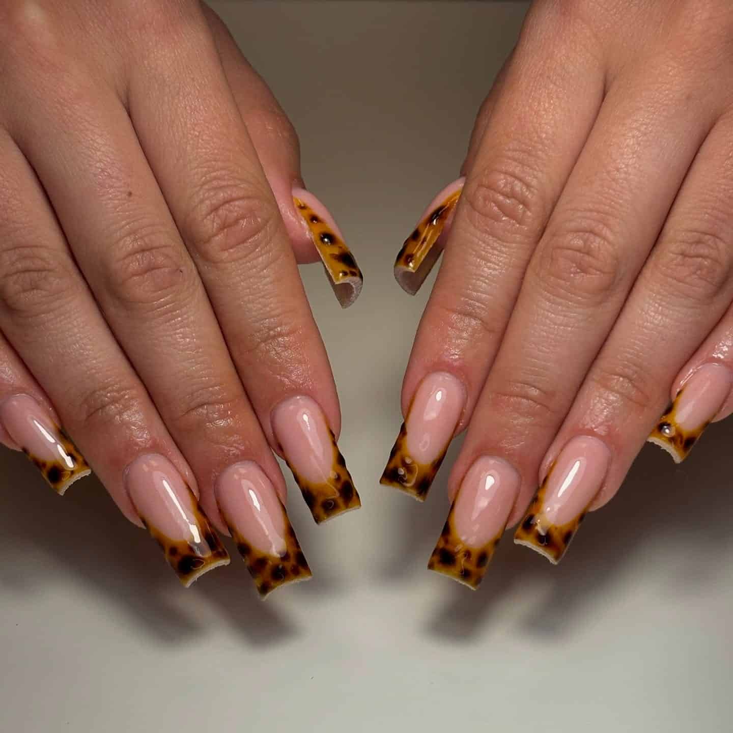 8. Square Nude Nails with Bold Tortoiseshell French Tips - turtle nail ideas