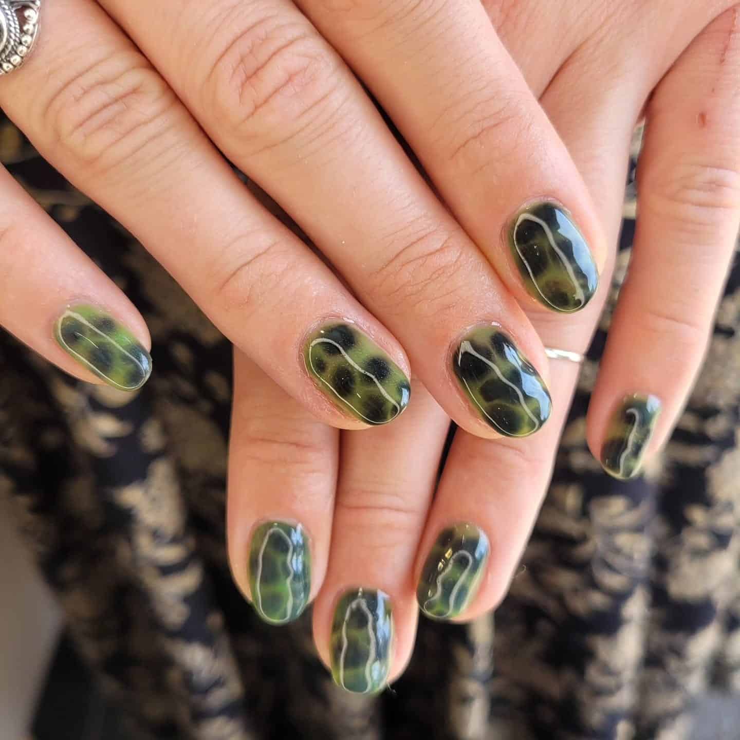 12. Short Oval Green Turtle Shell Nails - turtle nail ideas