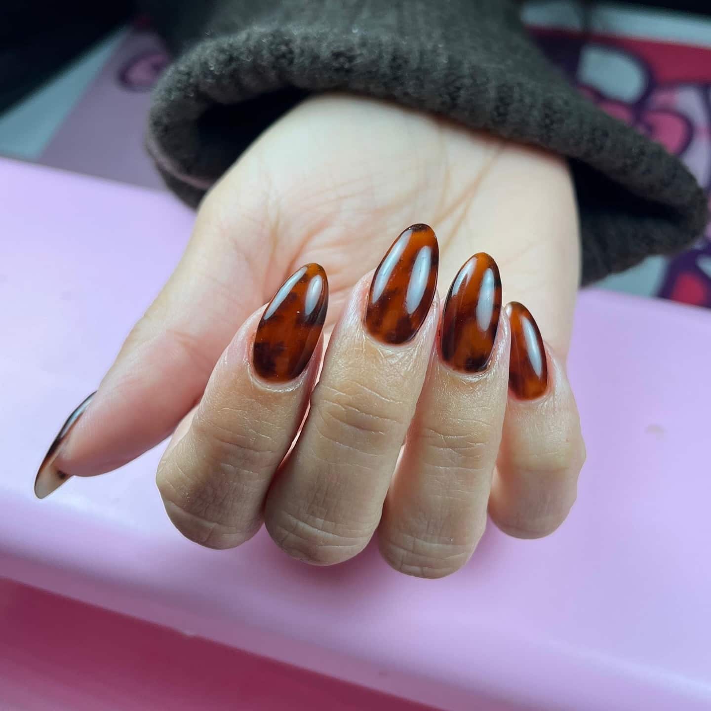 13. Almond Tortoiseshell Nails in Warm Amber Brown - turtle nail ideas