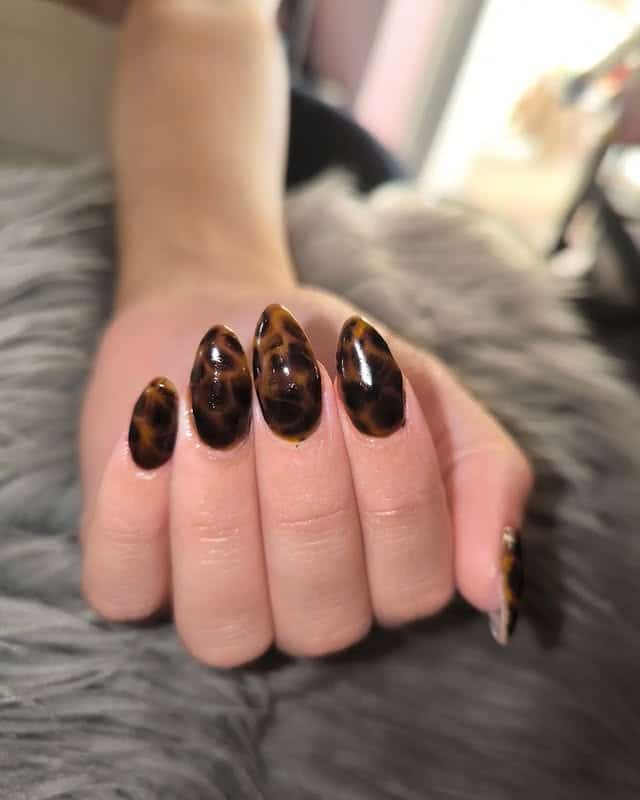 21. Almond Tortoiseshell Nails in Deep Brown Gloss - turtle nail ideas