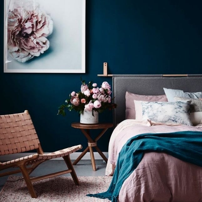 14. Soft Dark Blue Bedroom with Blush Accents - dark blue bedroom ideas