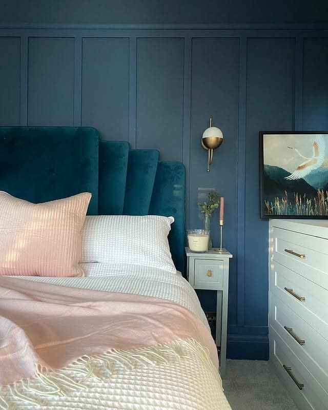19. Dark Blue Bedroom with Paneled Walls and Upholstered Headboard - dark blue bedroom ideas