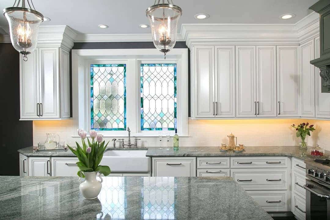 4. White Victorian Kitchen with Stained Glass Details - victorian style kitchen ideas