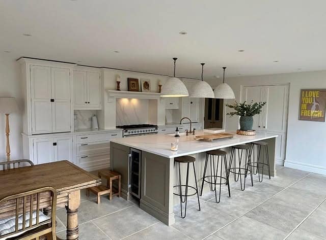 11. Soft Stone Victorian Kitchen with Classic Island - victorian style kitchen ideas