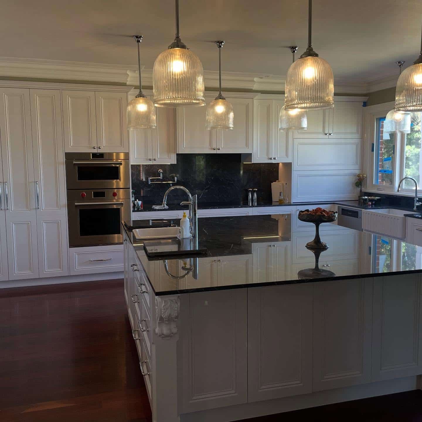 12. White Victorian Kitchen with Black Marble Contrast - victorian style kitchen ideas