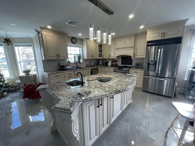 14. Cream Victorian Kitchen with Ornate Island Base - victorian style kitchen ideas