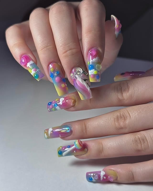 15. 3D Rainbow Unicorn Acrylic Nails - unicorn nail ideas