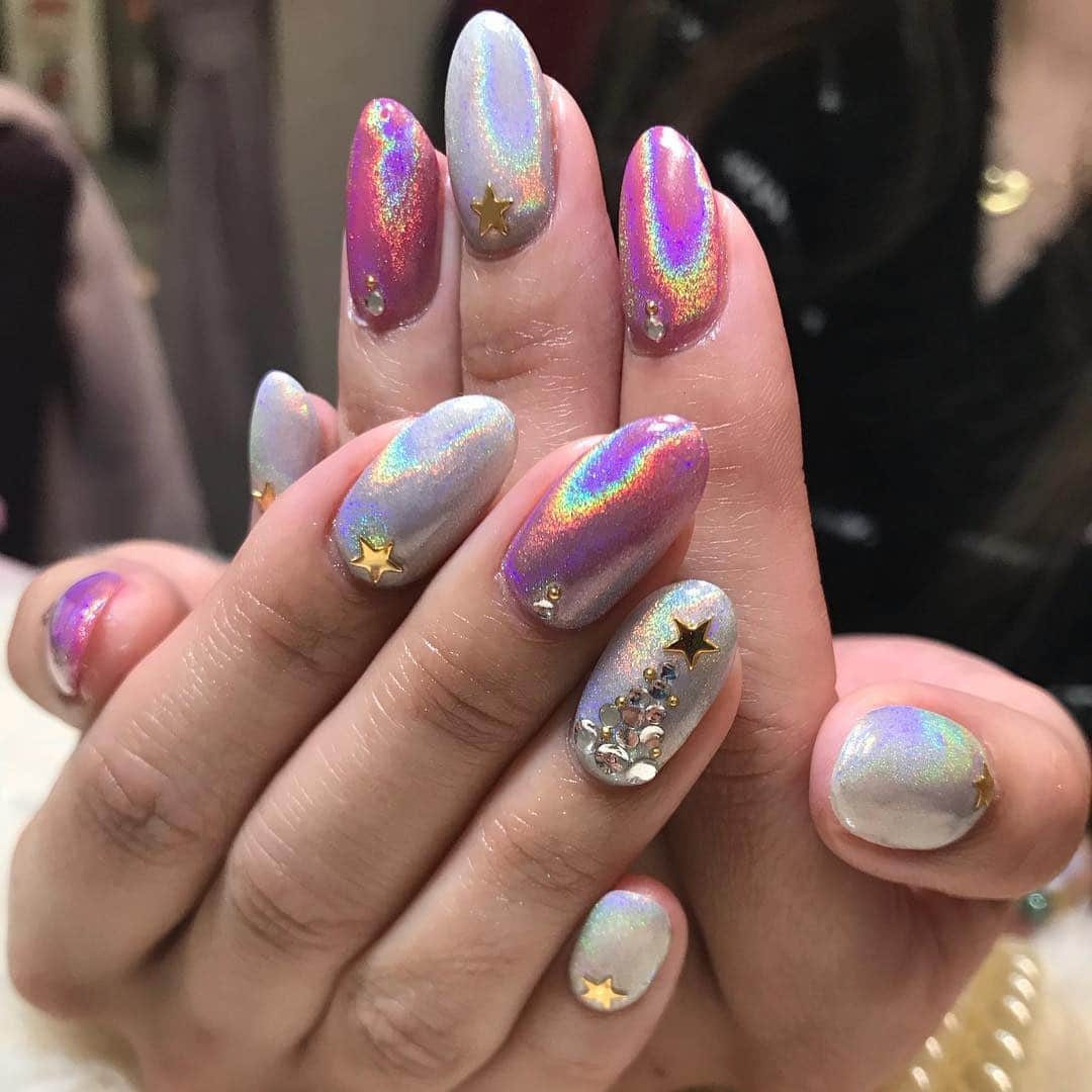 20. Holographic Silver Unicorn Accent Nails - unicorn nail ideas