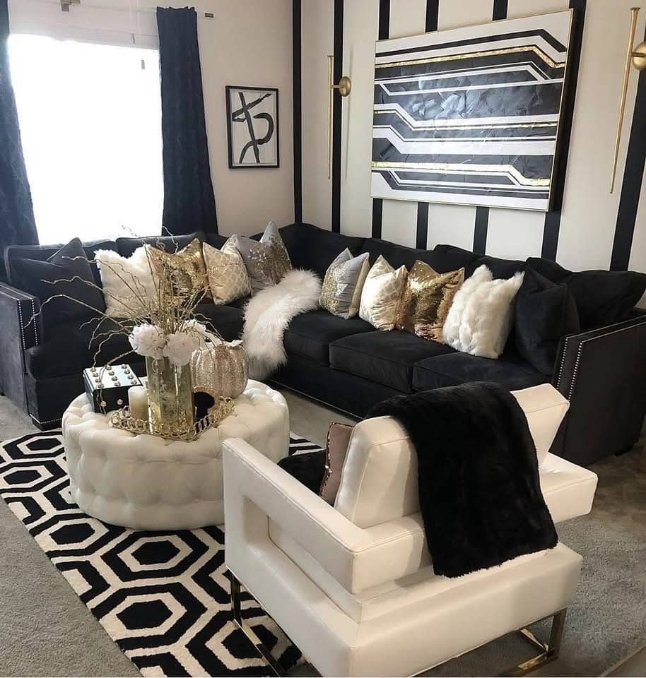5. Patterned Black Living Room with Gold Decor Highlights - black and gold living room ideas