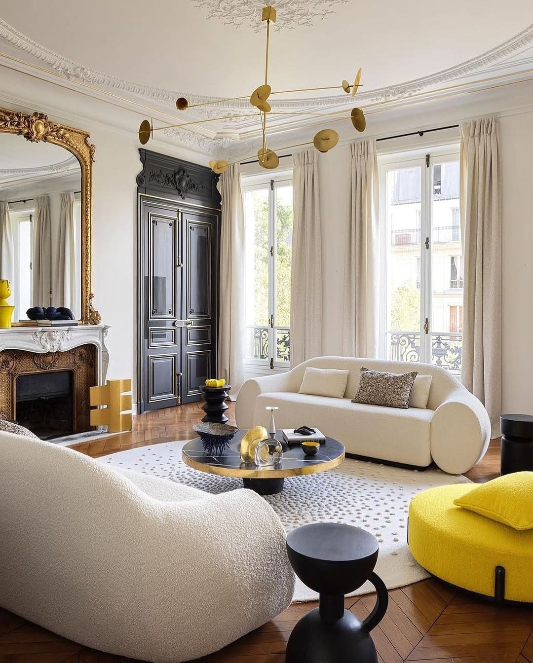 6. Parisian-Inspired Black and Gold Living Room - black and gold living room ideas