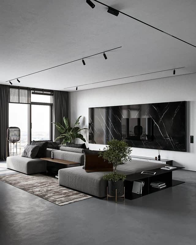 1. Modern Black Living Room with Sculptural Minimalism - black living room ideas