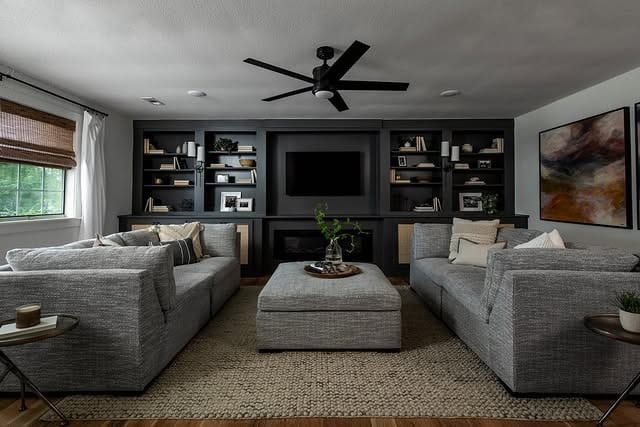 6. Soft Black and Gray Living Room with Built-In Shelving - black living room ideas