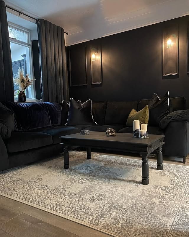 8. Elegant Black Living Room with Panelled Walls - black living room ideas