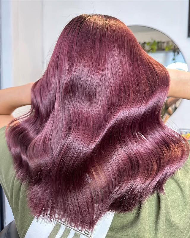 3. Polished Long Waves in Classic Burgundy - Burgundy Hair Color