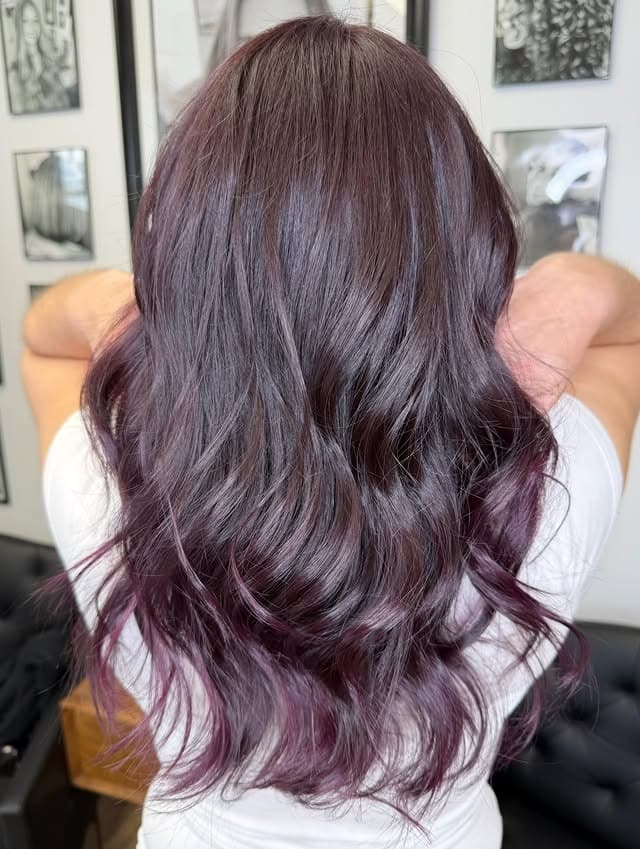 8. Smoky Plum-Burgundy with Layered Waves - Burgundy Hair Color