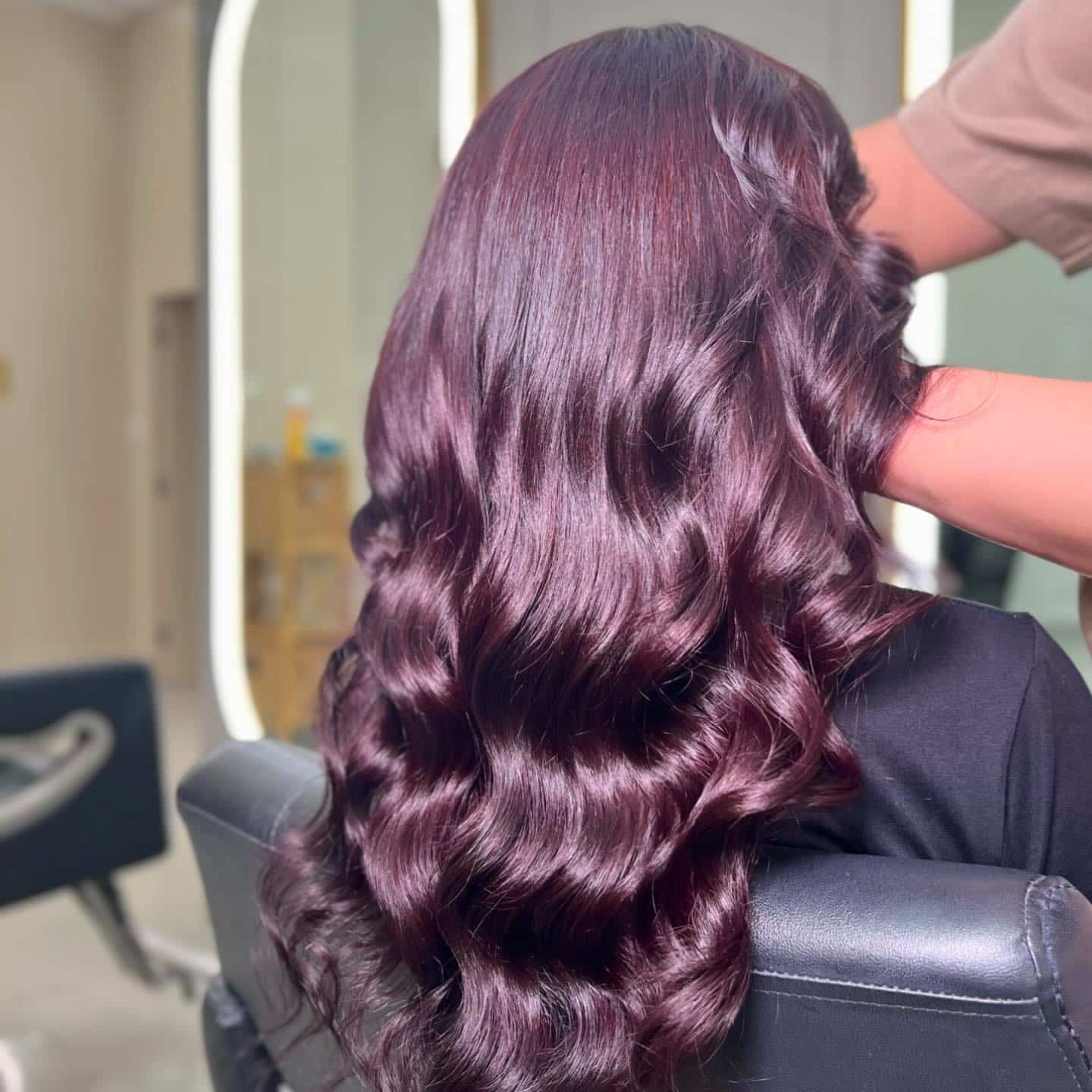 9. High-Gloss Burgundy Waves with Full Length Layers - Burgundy Hair Color